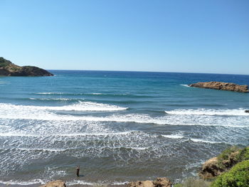 Scenic view of sea against clear sky