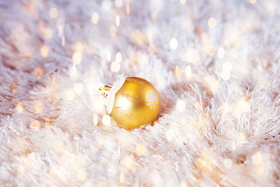 Close-up of bauble on fake fur