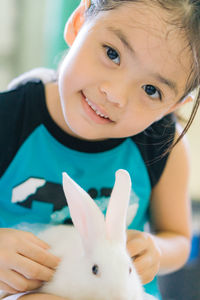 Portrait of cute girl smiling