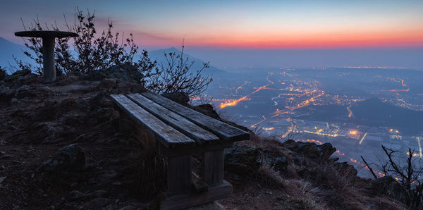 Scenic view of building against sky at sunset