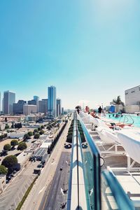 High angle view of city against clear blue sky