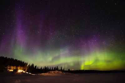 Landscape against sky at night