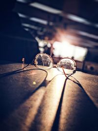 Close-up of eyeglasses on road