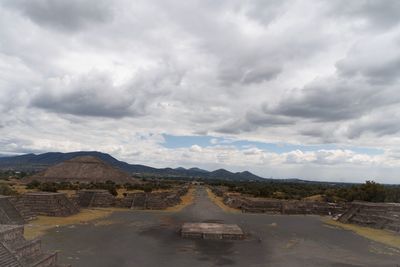 Panoramic view of landscape against cloudy sky