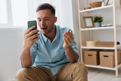 Young woman using mobile phone