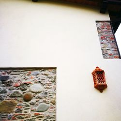 High angle view of art on table against wall