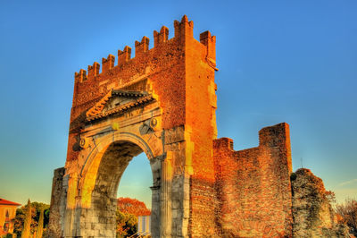 Low angle view of historic building against sky