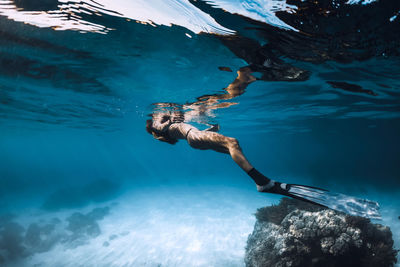 Man swimming in sea