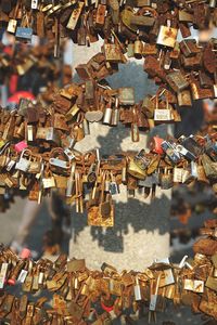 Close-up of padlocks hanging on railing