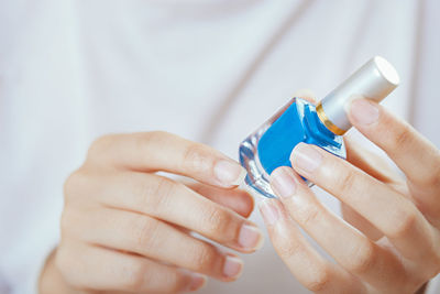 Close-up of woman holding hands