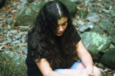 Beautiful young woman looking away