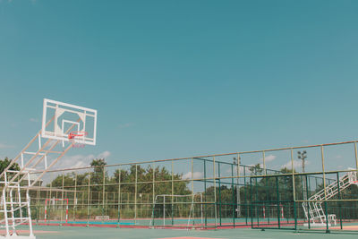View of basketball hoop against clear sky