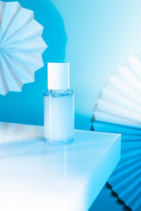 Close-up of glass bottle on table