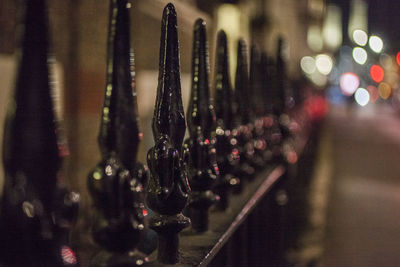 Close-up of wine bottles on glass