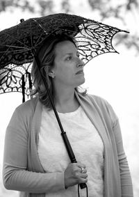 Portrait of woman standing outdoors