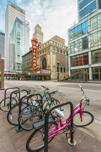 Bicycles parked on road in city