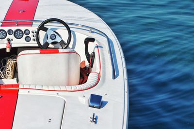 High angle view of men sailing in sea