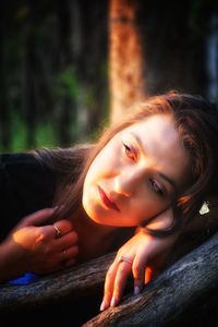 Portrait of beautiful young woman looking away