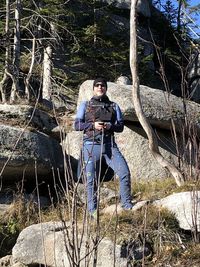 Portrait of man on rock