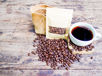 High angle view of coffee cup on table