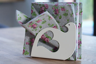 Close-up of paper on table