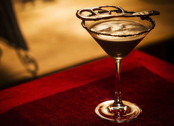 Close-up of beer glass on table