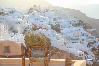 High angle view of residential district on mountain at santorini island