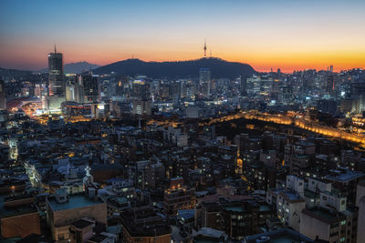 Sunset view over seoul city with view of n seoul tower. taken from changsindong, seoul, south korea