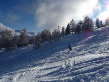 Scenic view of snowcapped mountain against sky