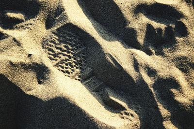 High angle view of shadow on sand