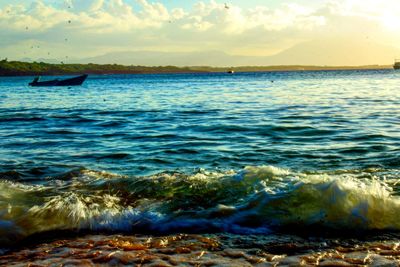 Scenic view of sea against sky during sunset