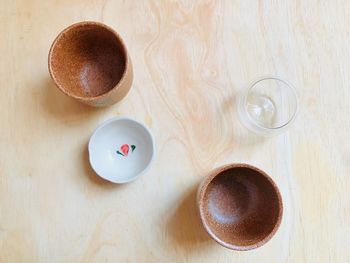 High angle view of coffee cup on table