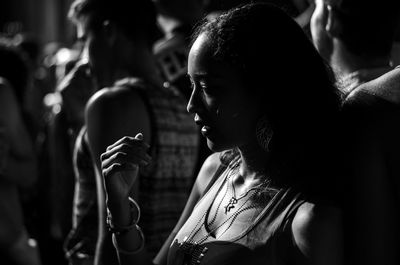 Close-up of young woman in nightclub