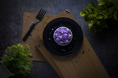 High angle view of wine in glass on table