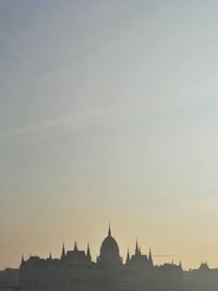 Silhouette of building against sky