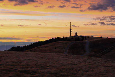 Scenic view of silhouette landscape against sky during sunset