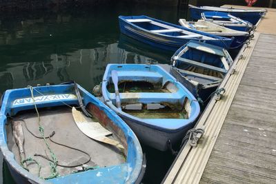 High angle view of boats moored in sea at harbor