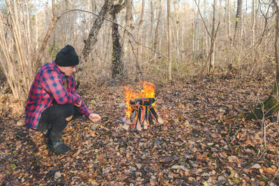 Man in forest during autumn