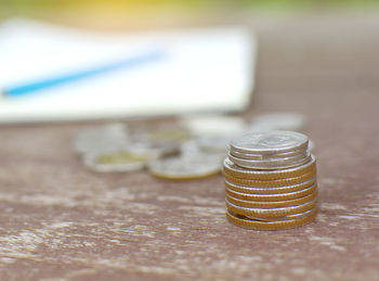 Close-up of coins on table