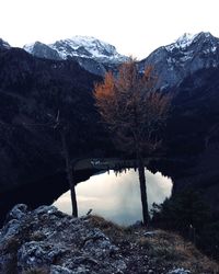 Scenic view of snow covered mountains against sky