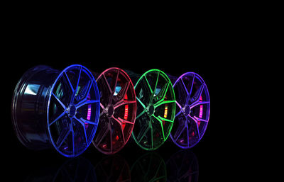 Multi colored light painting against black background