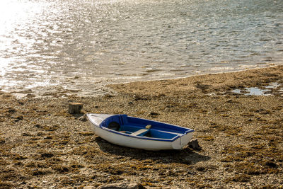 High angle view of boats moored on shore