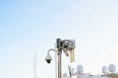 Low angle view of street light against clear sky