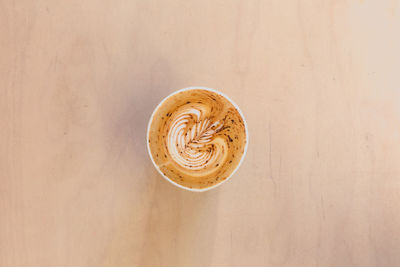 Close-up of coffee cup on table