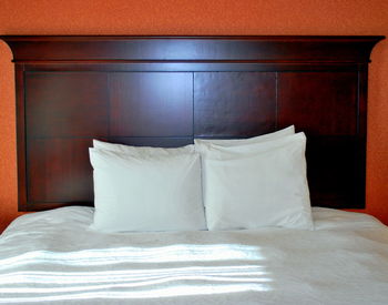 View of bed in the dark room at home