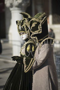 People wearing mask and costume during carnival