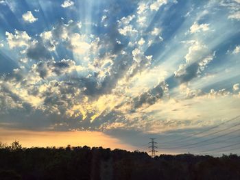 Scenic view of silhouette trees against sky during sunset