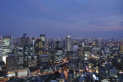 Illuminated cityscape at night