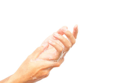 Close-up of woman hand with water