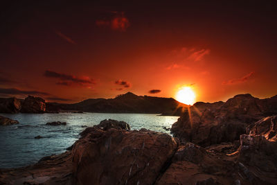 Scenic view of sea against sky during sunset